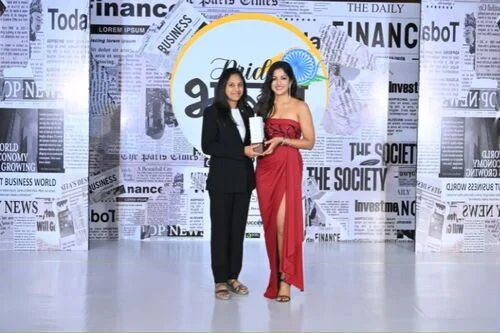 Chief Nutritionist Vasanthi Senthilvel receiving the Pride of Bharat Award 2026